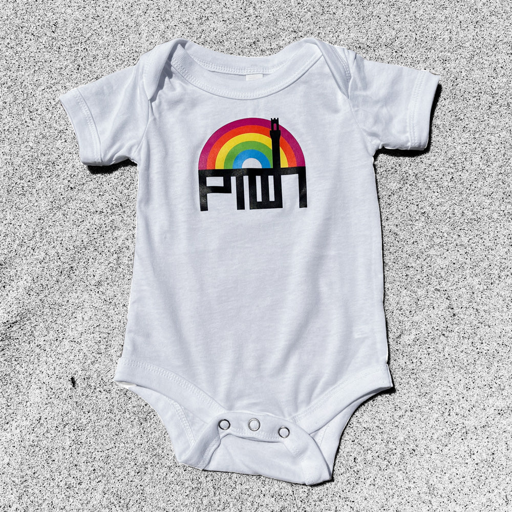 A white baby onesie with a colorful rainbow and 'PTOWN' text printed on the front.