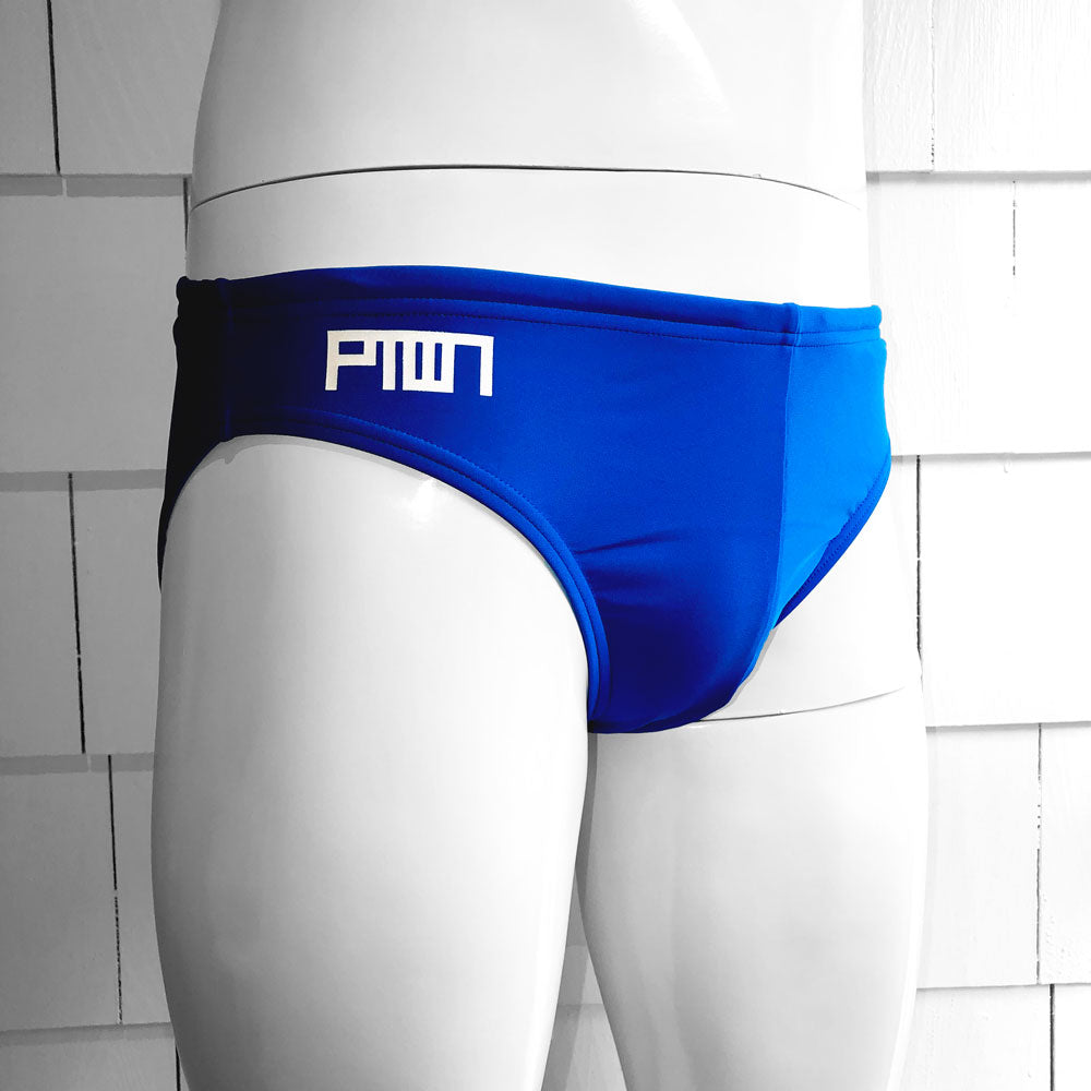 A royal blue Speedo brief featuring the PTOWN brand logo on the waistband.